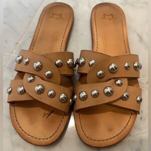 Marc Fisher slides with silver details.